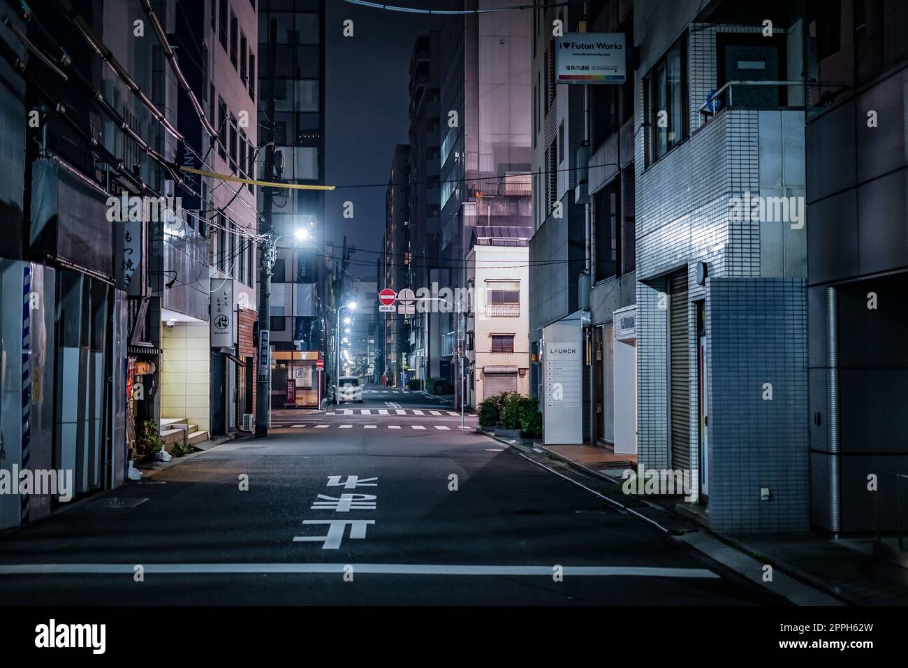 Alley back night view of Chuo-ku, Tokyo Stock Photo