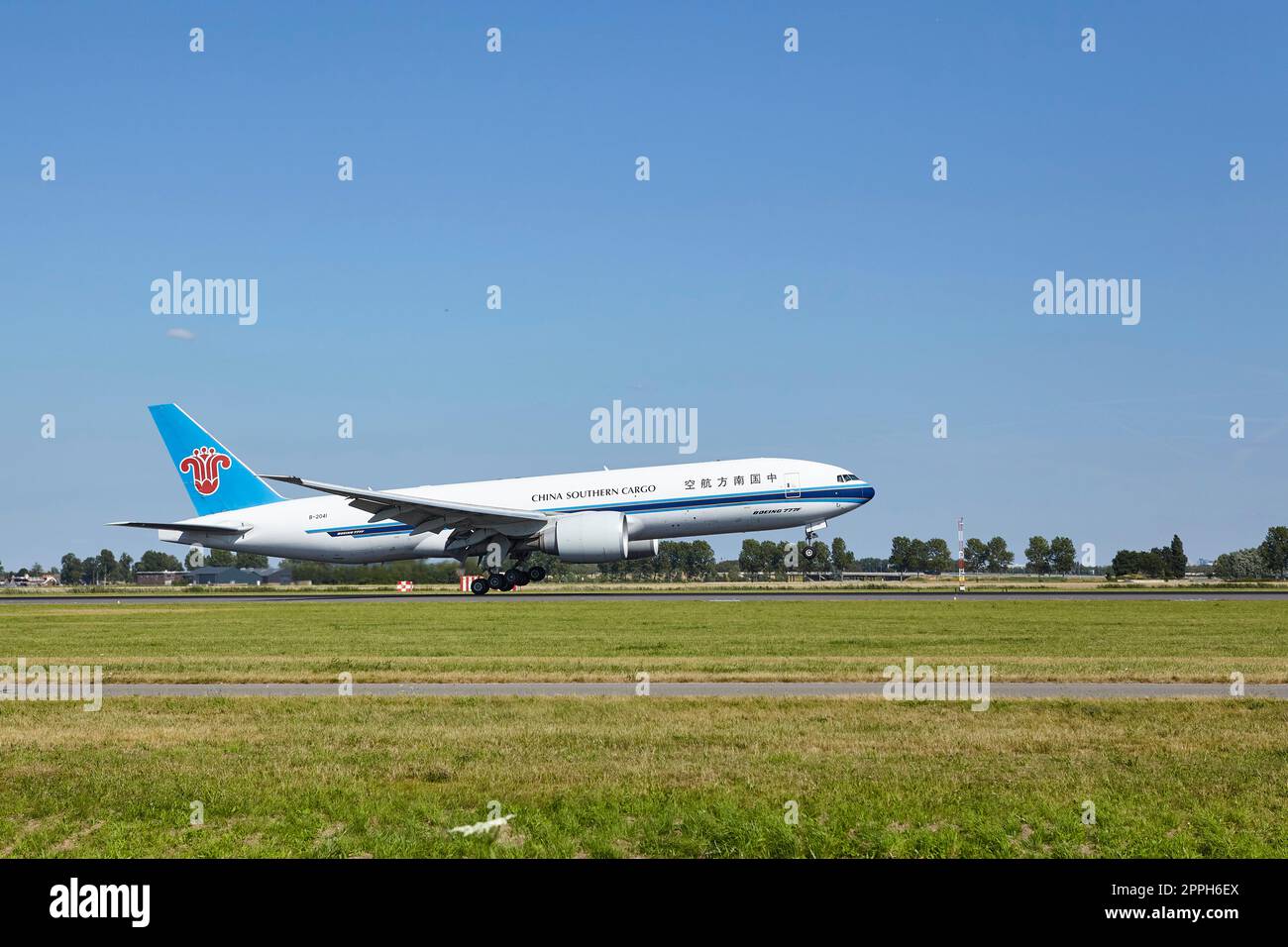 Amsterdam Airport Schiphol - Boeing 777-F1B of China Southern Cargo lands Stock Photo