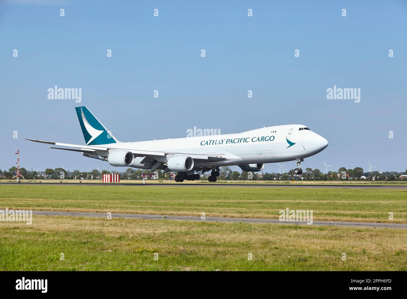 Amsterdam Airport Schiphol - Boeing 747-867F of Cathay Pacific Cargo lands Stock Photo
