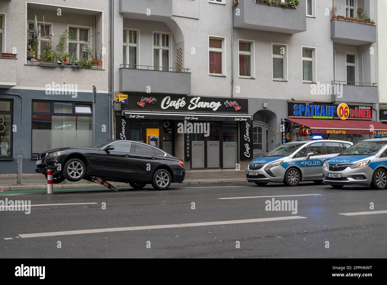 In the early hours of the morning, a passenger car hit the bollards of a bicycle path in the traffic-calmed HermannstraÃŸe (speed 30 km/h) in Berlin and suffered considerable damage to the underbody and engine compartment. The driver fled and left the veh Stock Photo