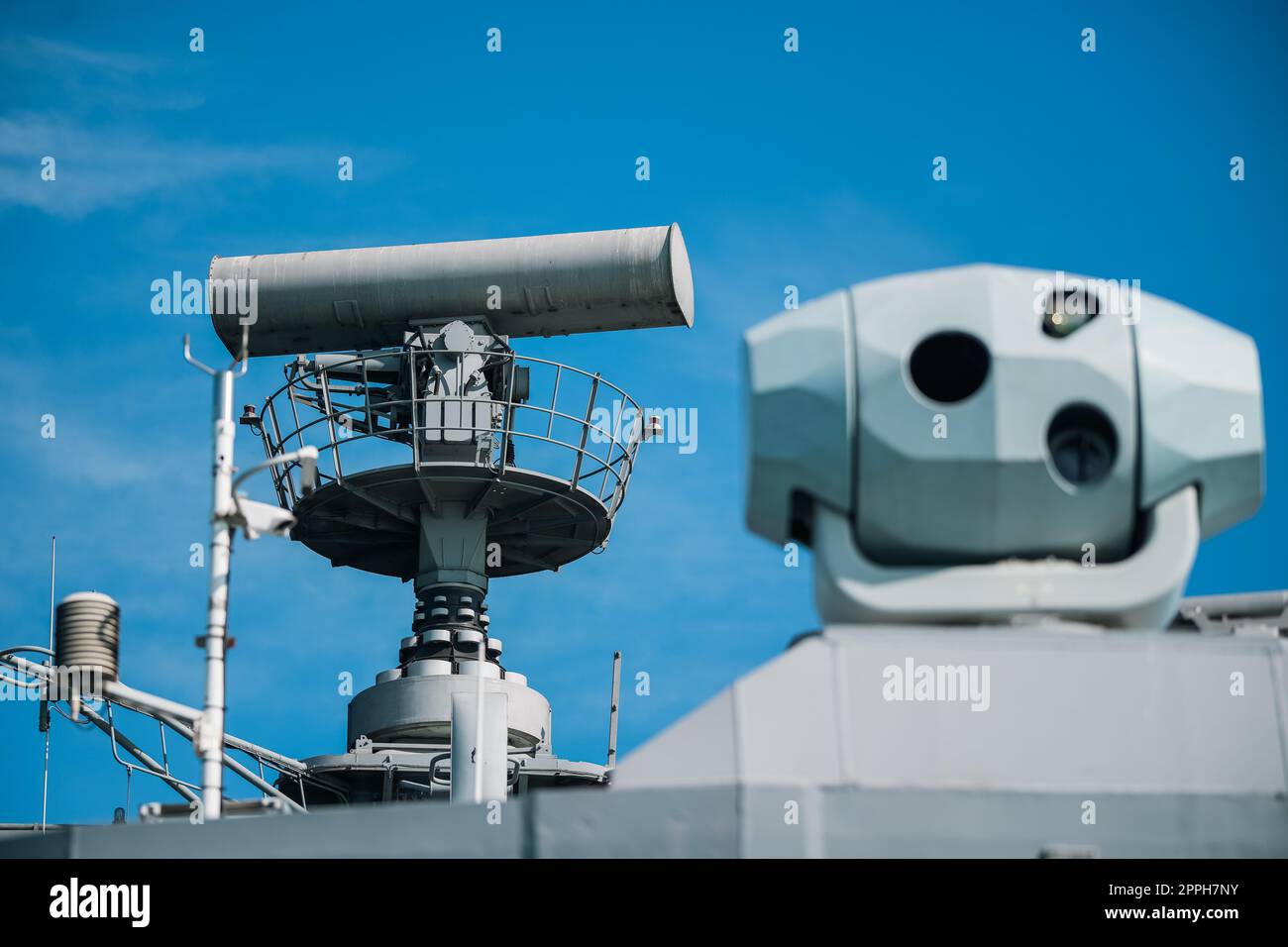 Military radar air surveillance on navy ship Stock Photo