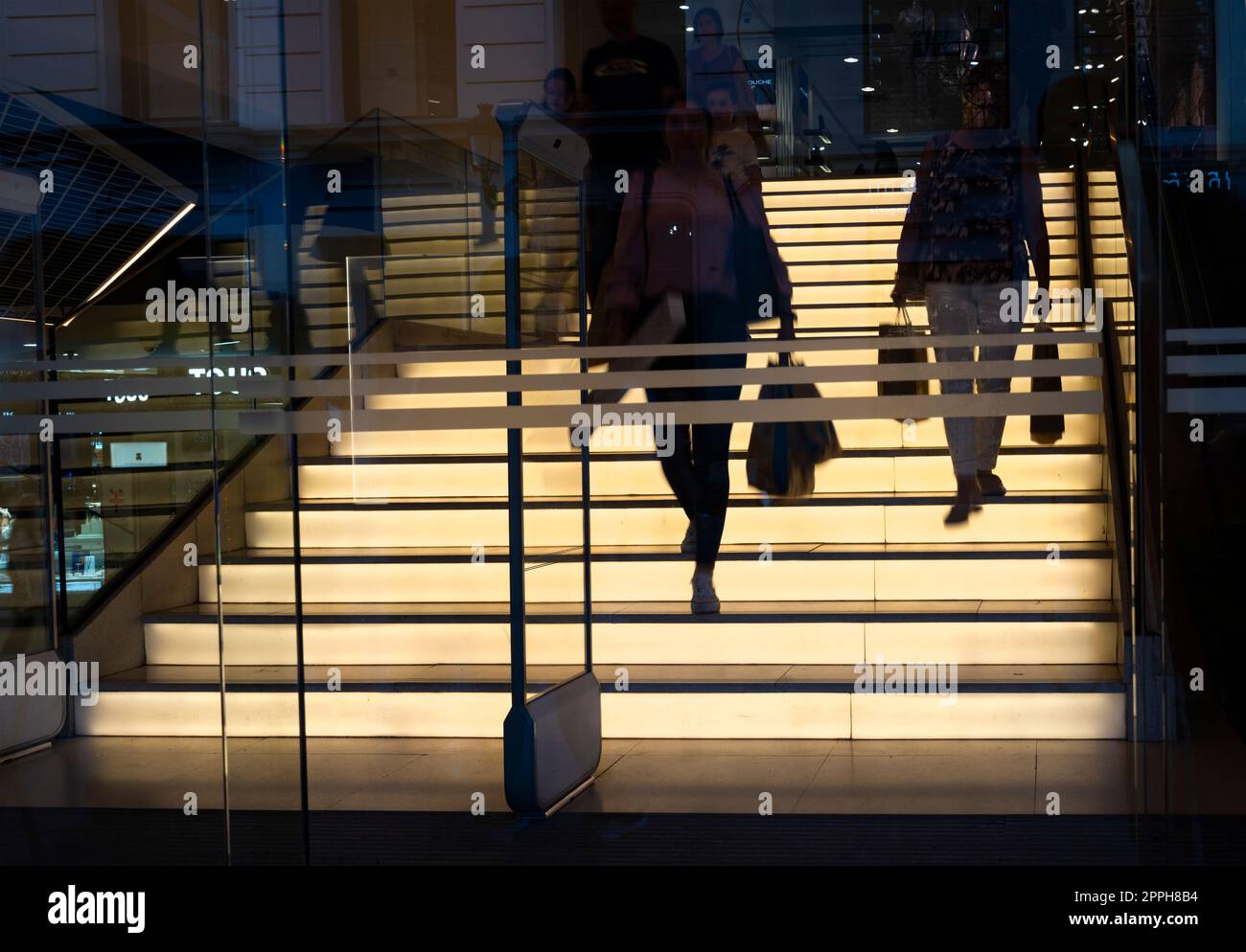 Walking down steps stairs hi-res stock photography and images - Alamy