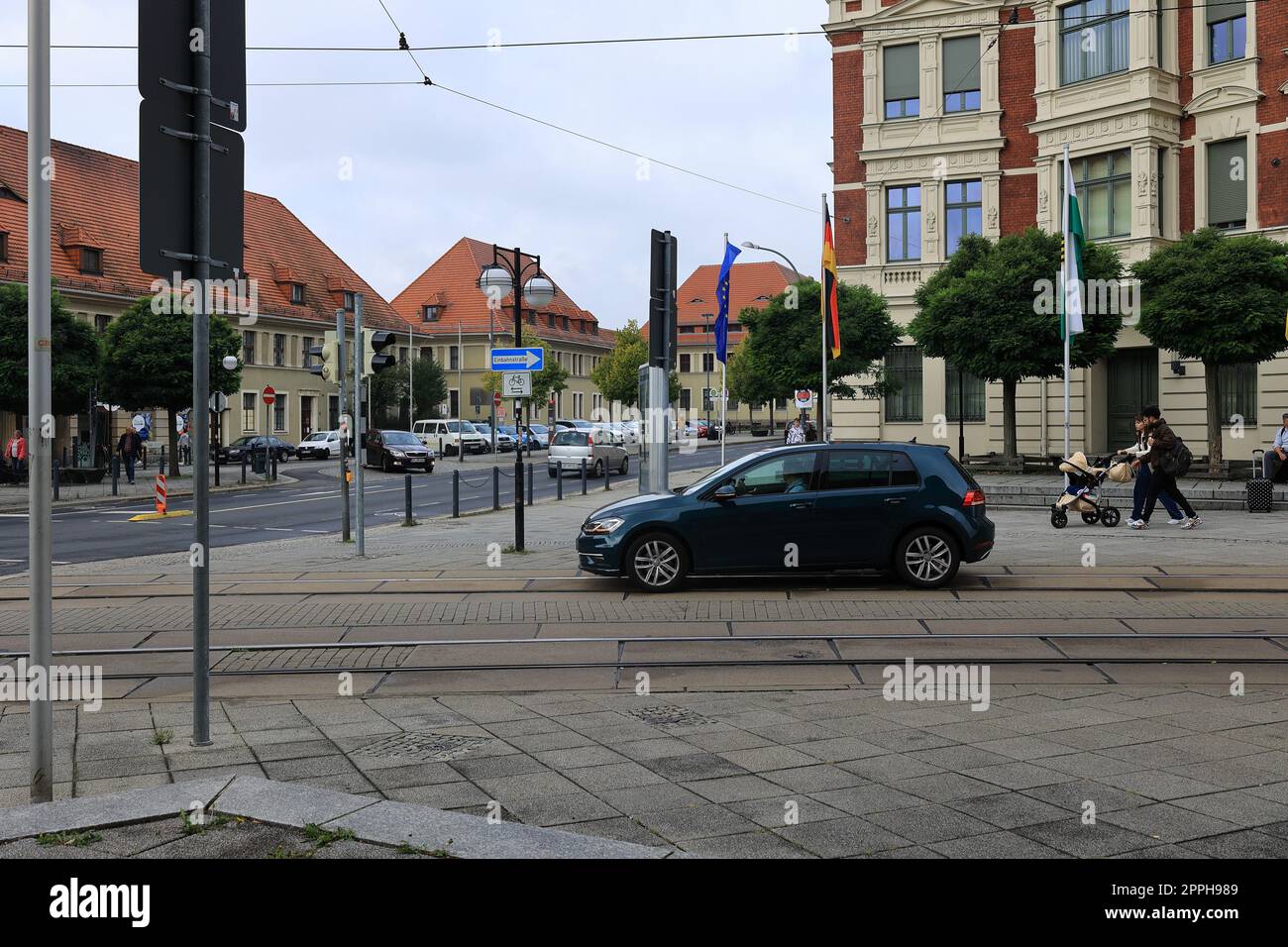 Cars drive out of a one-way street in GÃ¶rlitz Stock Photo