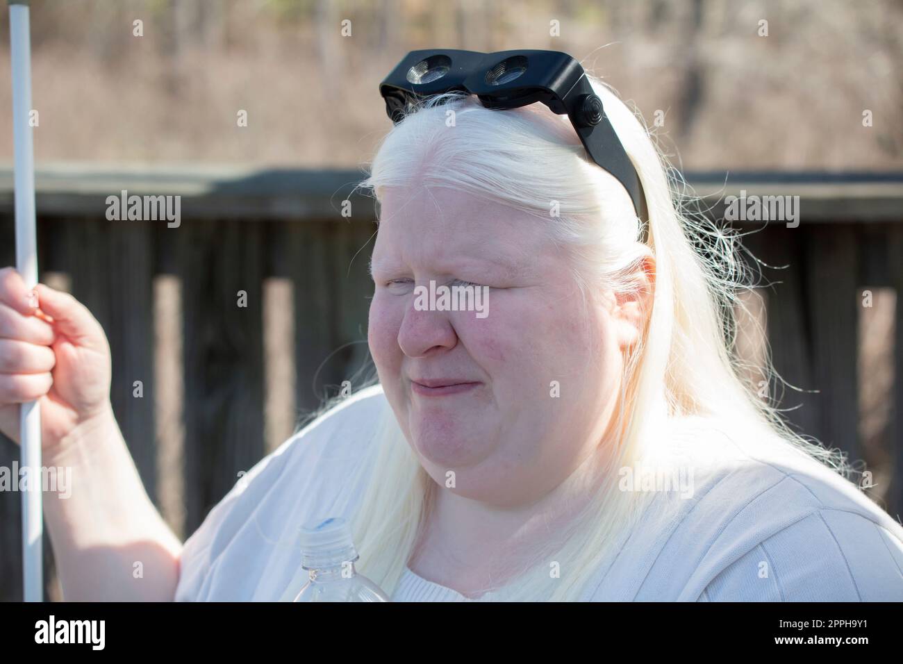 Legally Blind Woman in the Outdoors Stock Photo