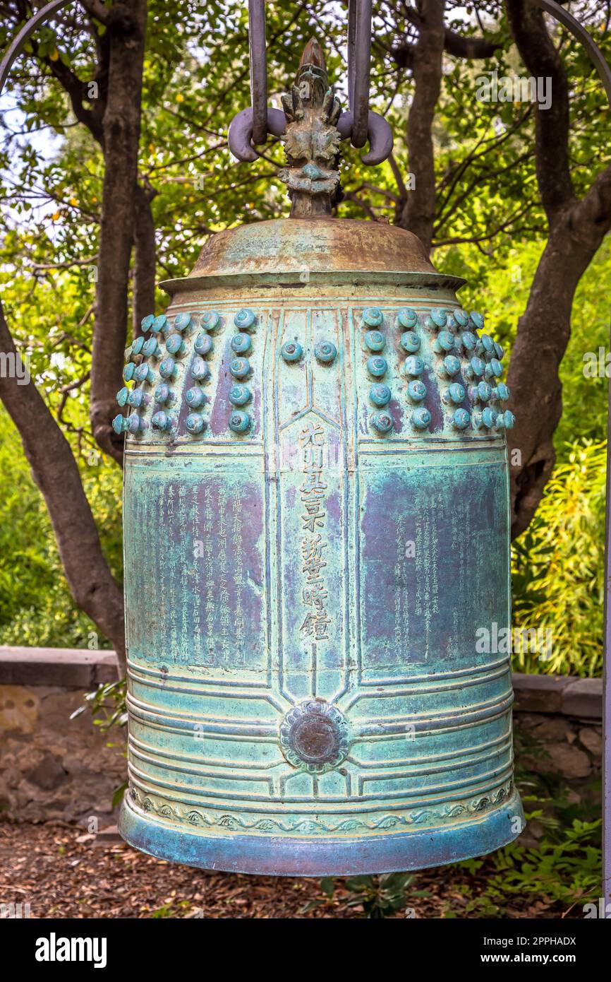 Old Japanese bell finely crafted in bronze Stock Photo