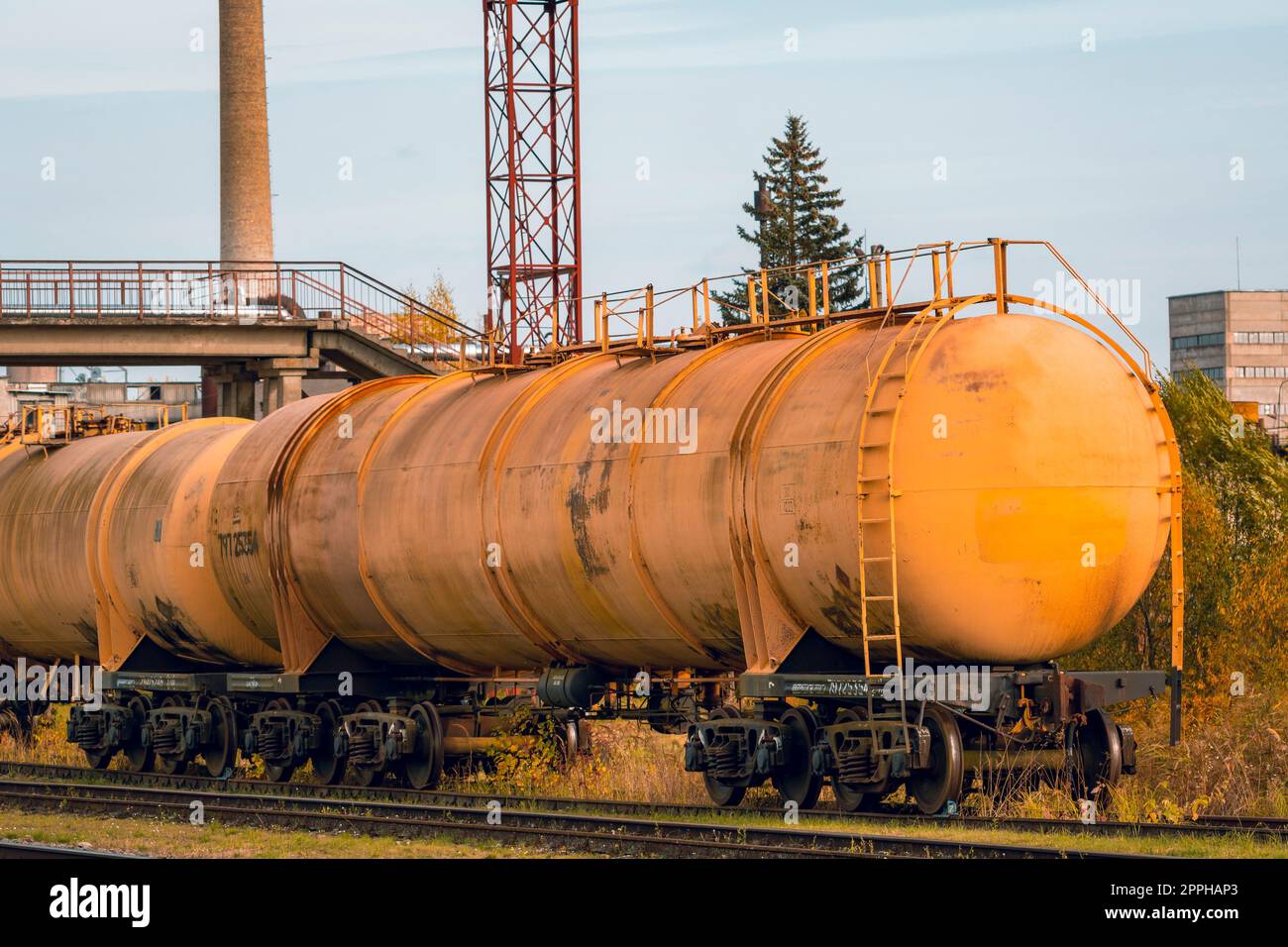 Last tank with oil petroleum of the cargo train Stock Photo