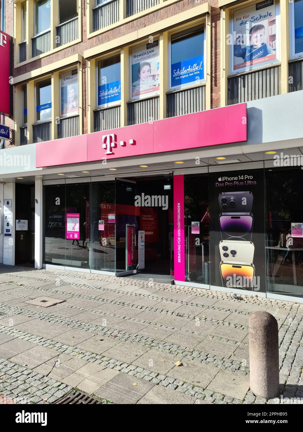 Kiel, Germany - 16. October 2022: The logo of the largest German telecommunication company named Telekom at a store. Stock Photo