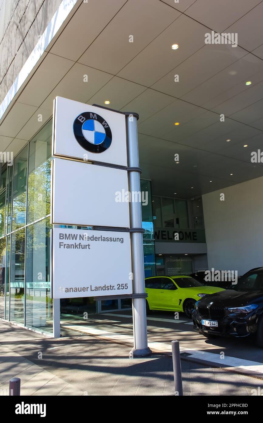 BMW car dealership with cars parked on forecourt. Stock Photo