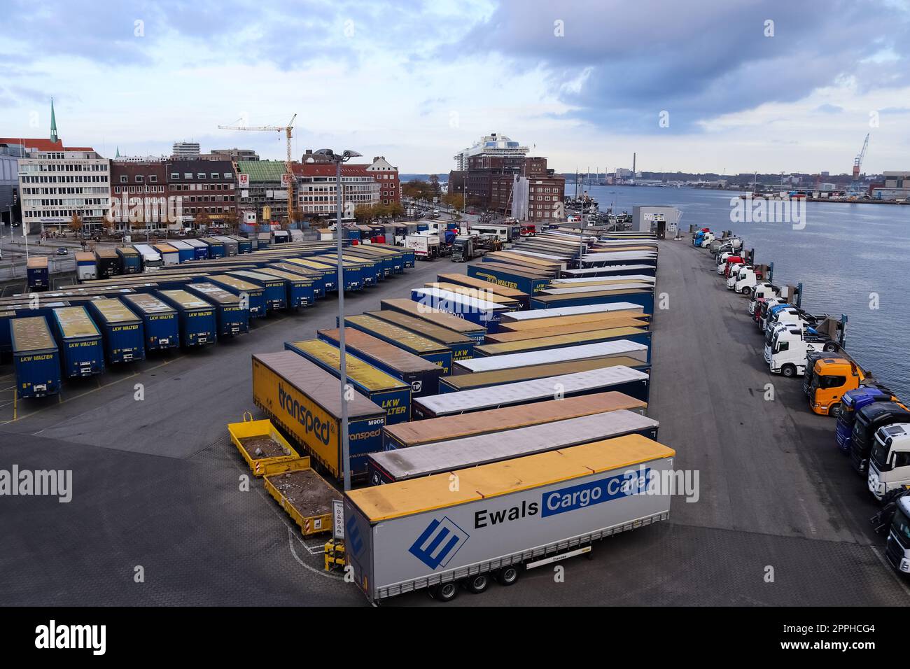 Kiel, Germany - 22. October 2022: Container and trucks waiting for the crossing to Sweden at Schwedenkai. Stock Photo