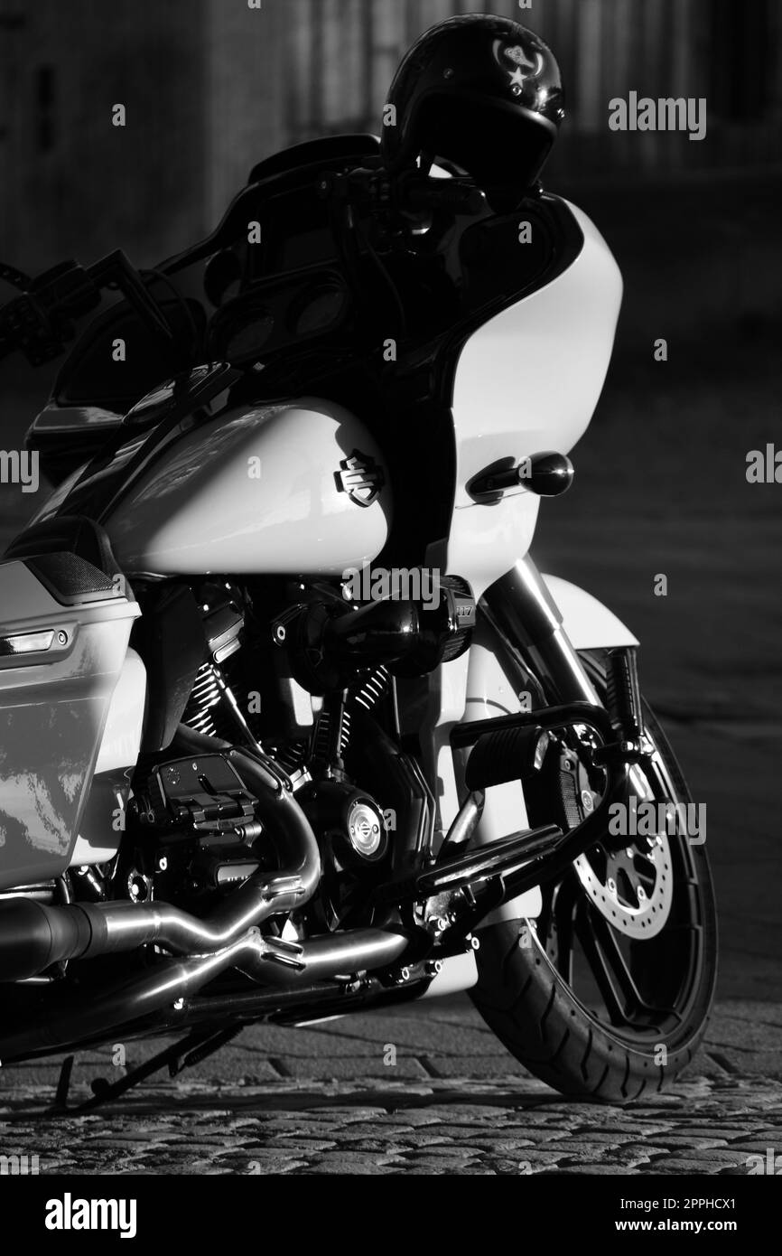 Vertical grayscale of a white chopper motorcycle. Stock Photo
