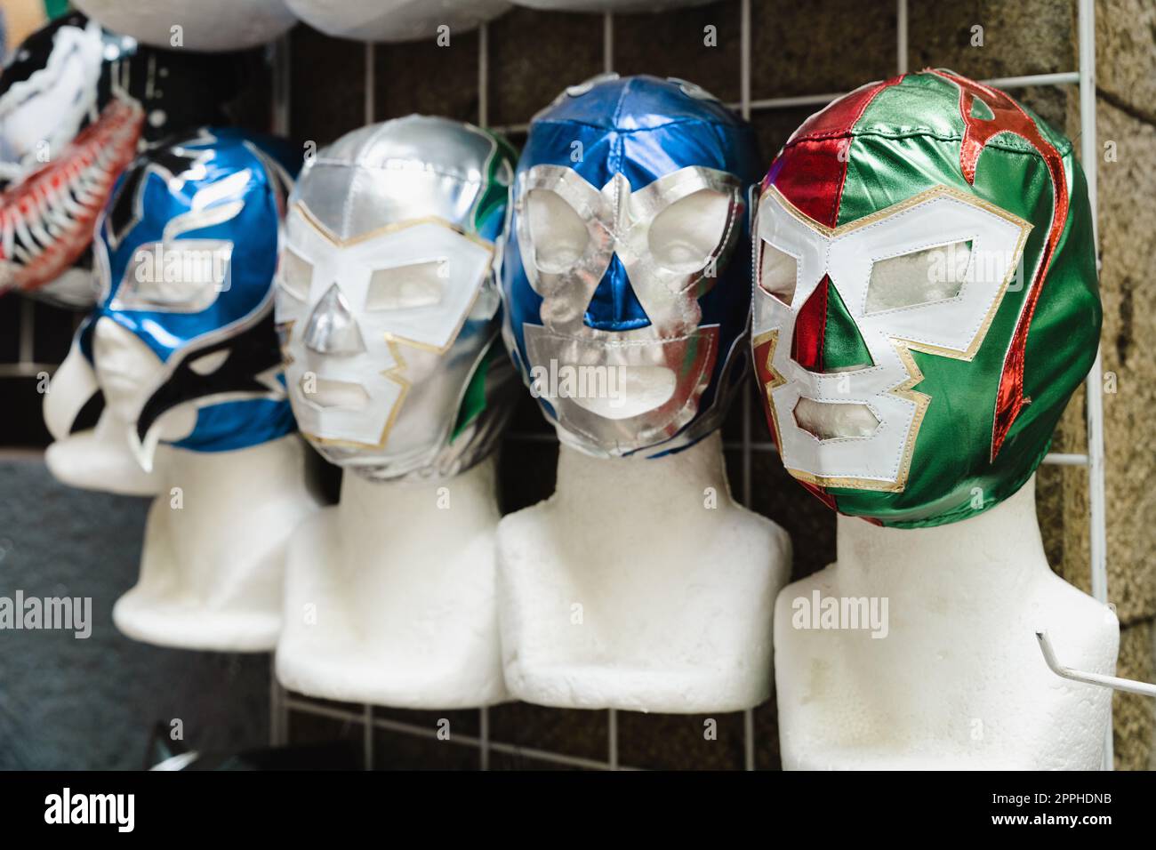 Mexican wrestling masks on mannequin heads Stock Photo