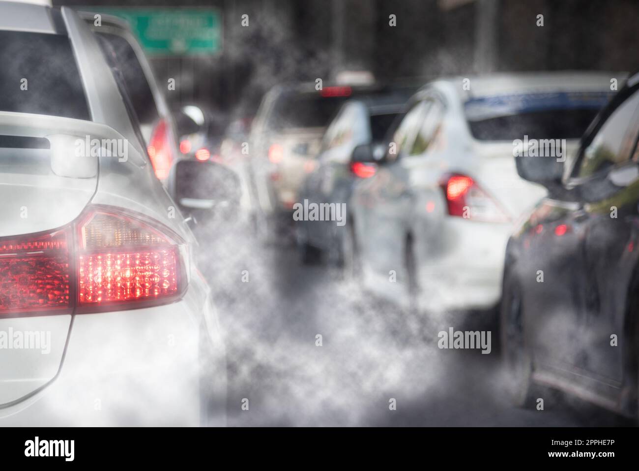 Air pollution from car exhaust smoke traffic in the city. Reducing ...