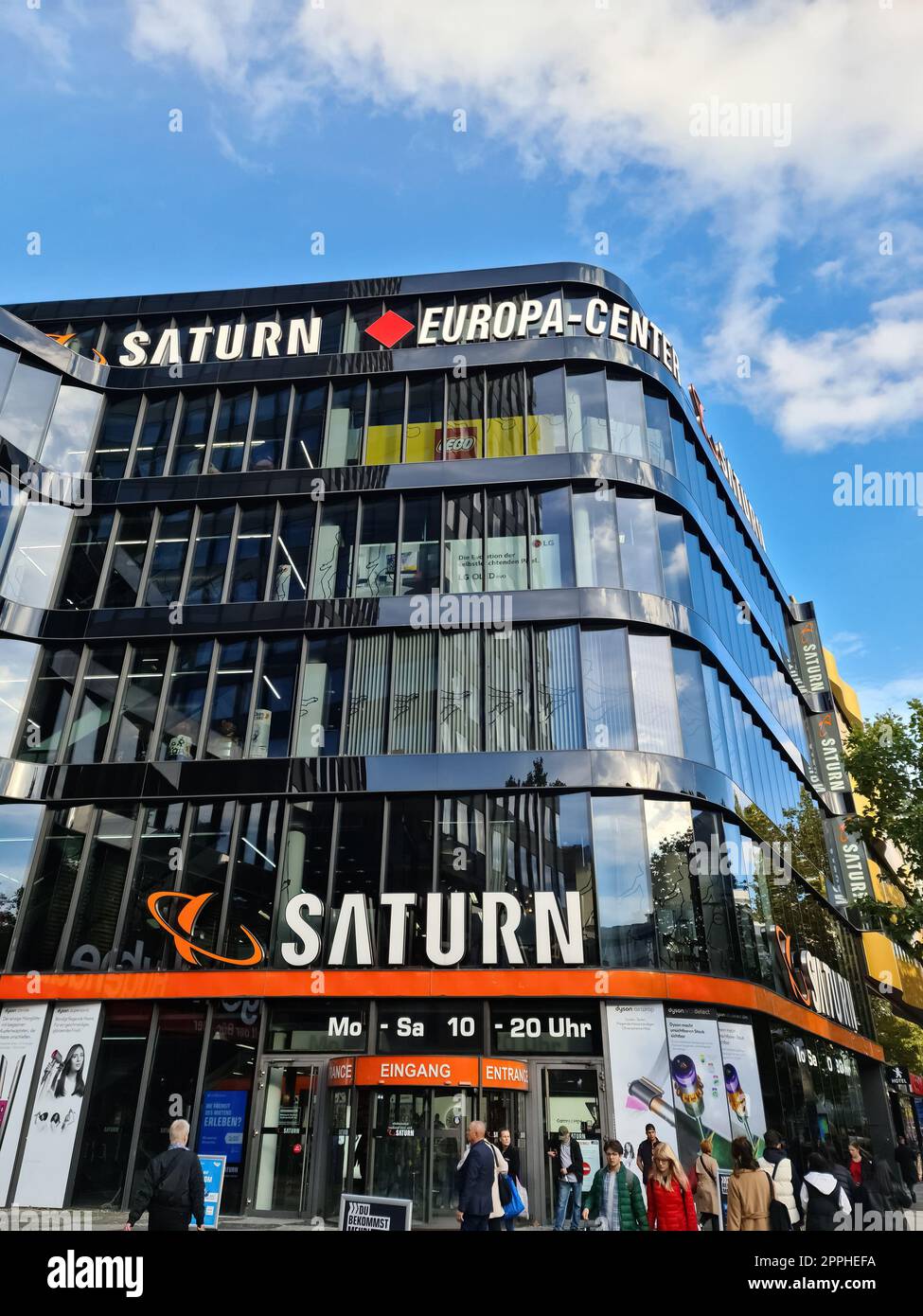 Berlin, Germany - 03. October 2022: The entrance to a Saturn electronics shop in fine weather in downtown Berlin.. Stock Photo