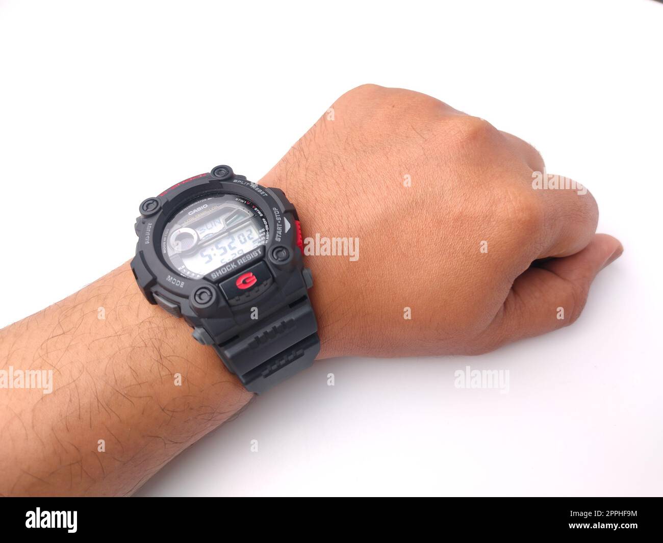 Malaysia,30 May 2022: Casio Men's G7900-1 G-Shock on a someone hand  isolated on white background Stock Photo - Alamy