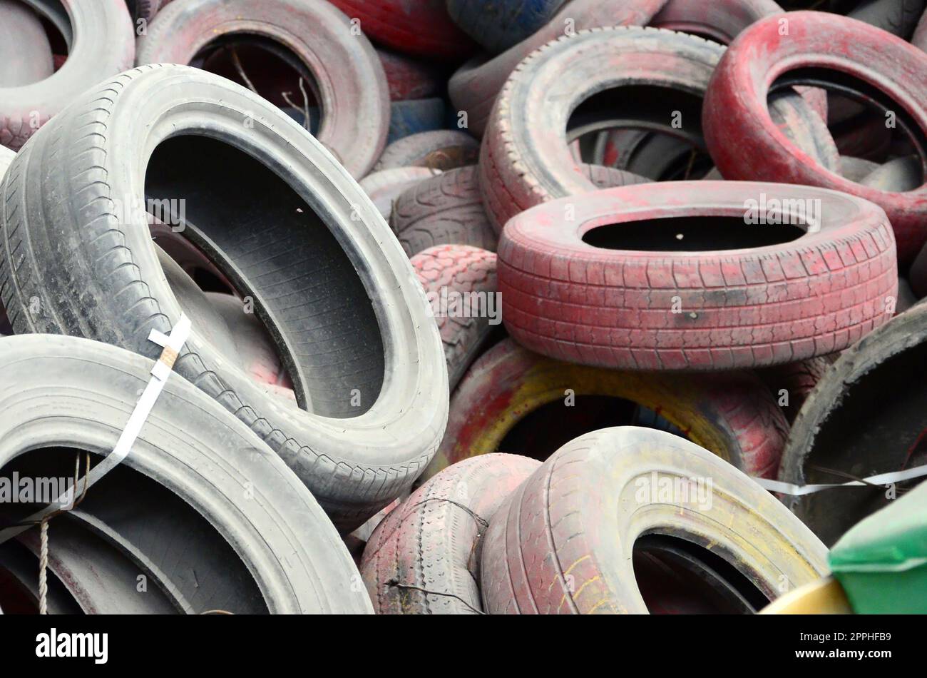 A picture of many old used tires left on a waste dump Stock Photo Alamy