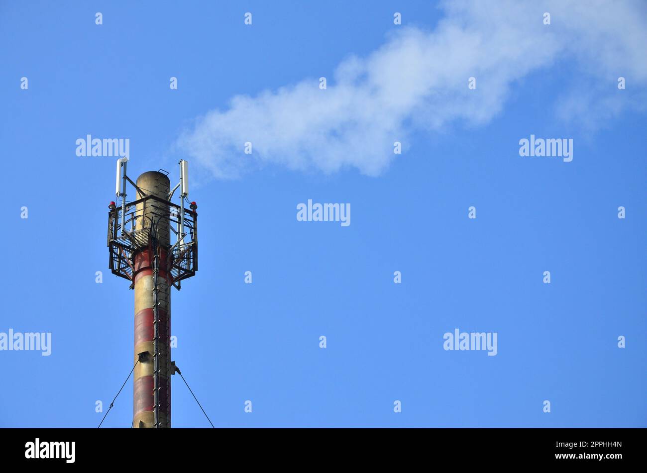 Chimney steam pipe of industrial manufacturing plant Stock Photo