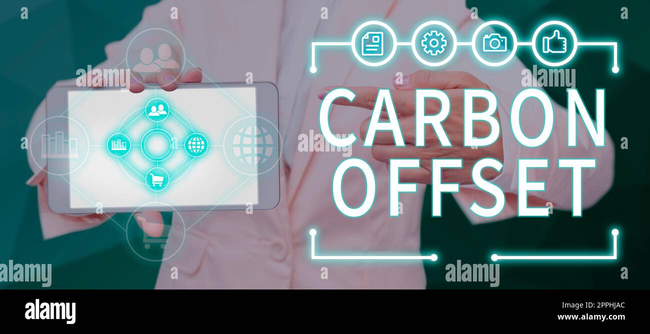 Text sign showing Carbon Offset. Business approach Reduction in emissions of carbon dioxide or other gases Stock Photo