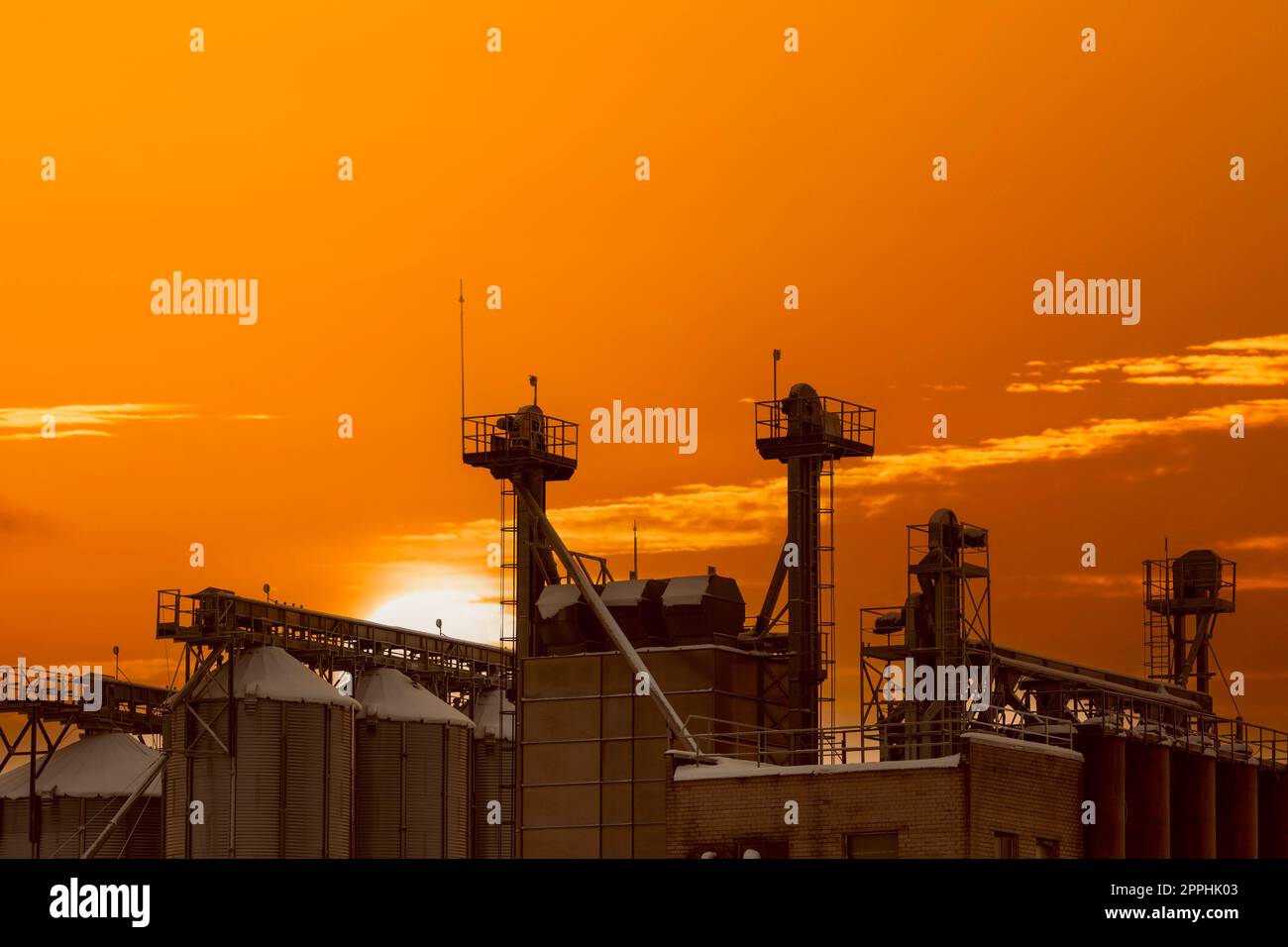 Industrial landscape at sunset time, stopped factory Stock Photo