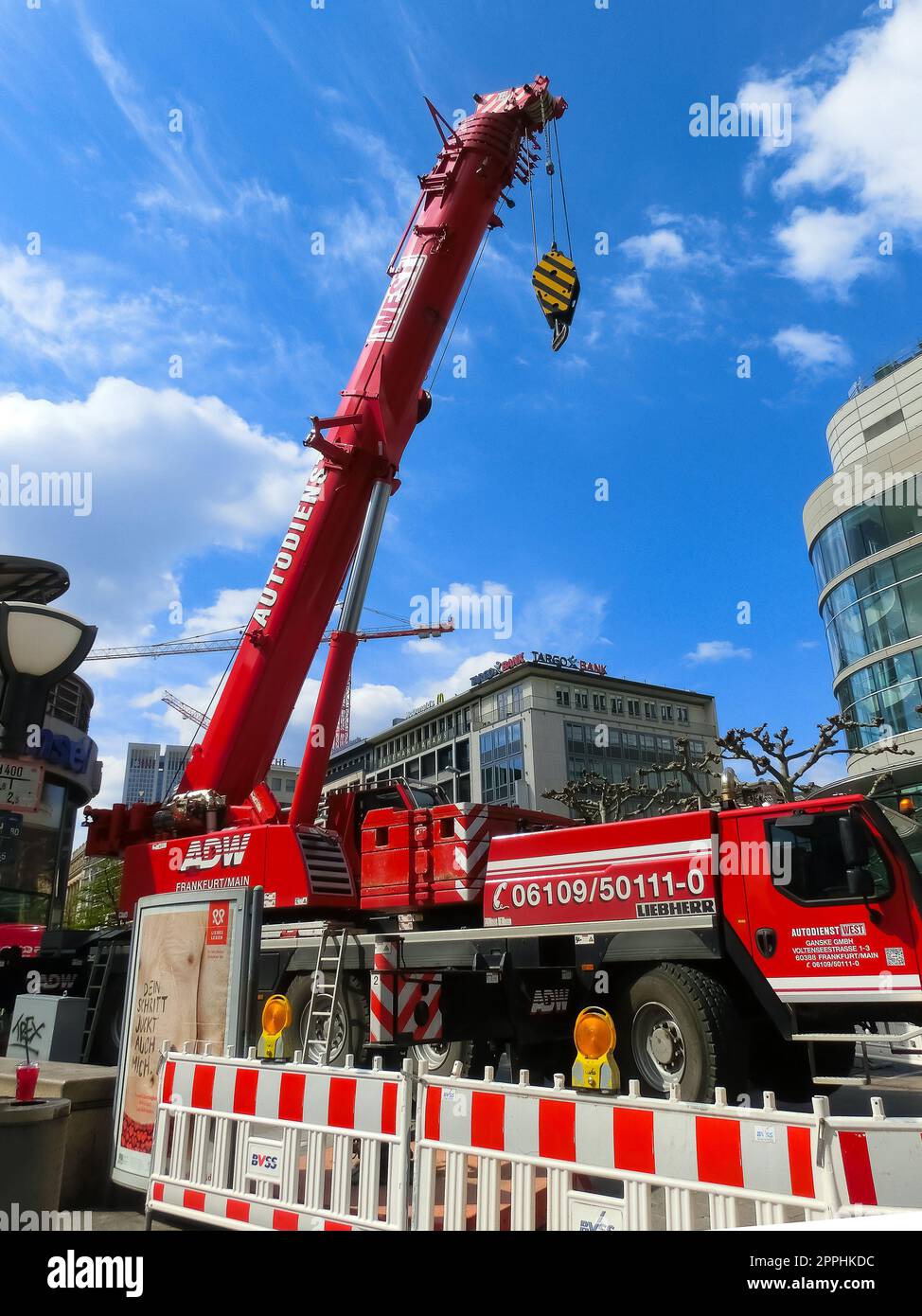 Liebherr mobile crane works on the street Stock Photo