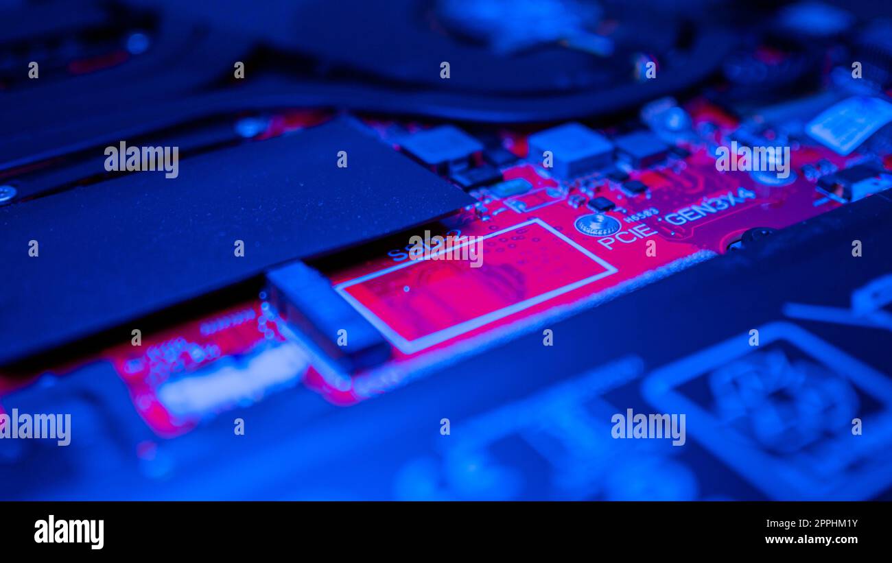 Circuit board with resistors microchips and electronic components. Computer hardware technology. Integrated communication processor. Information engineering. PCB. Stock Photo