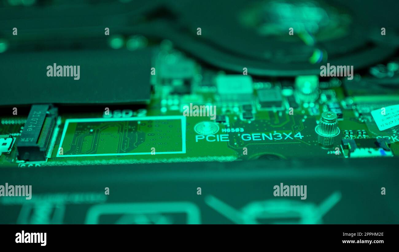 Circuit board with resistors microchips and electronic components. Computer hardware technology. Integrated communication processor. Information engineering. PCB. Stock Photo