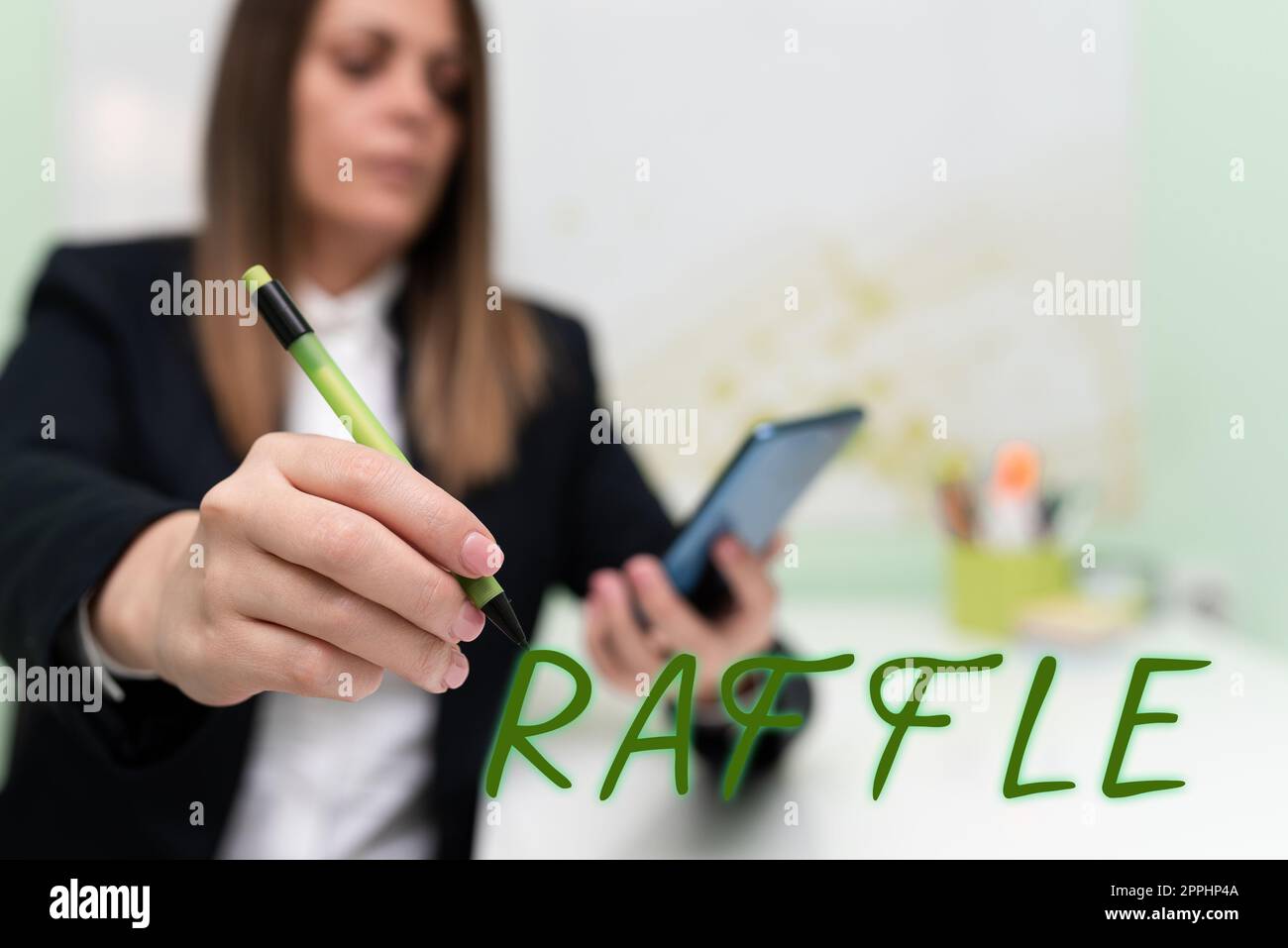 Handwriting text Raffle. Business concept means of raising money by selling numbered tickets offer as prize Stock Photo