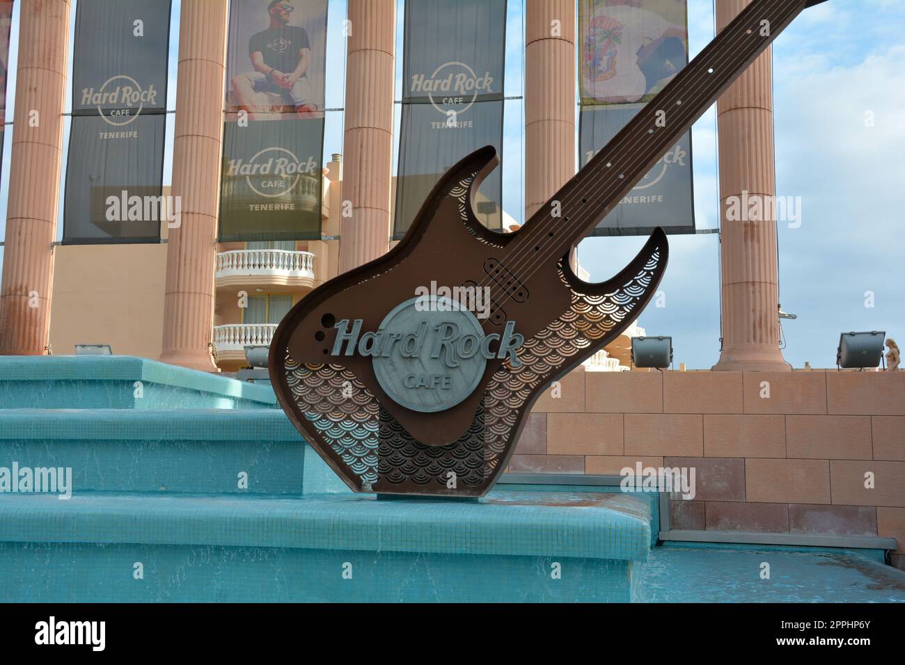 Hard Rock Cafe, Playa de la Americas, Tenerife, Spain August 12, 2022 - Building exterior with guitar and fountain Stock Photo