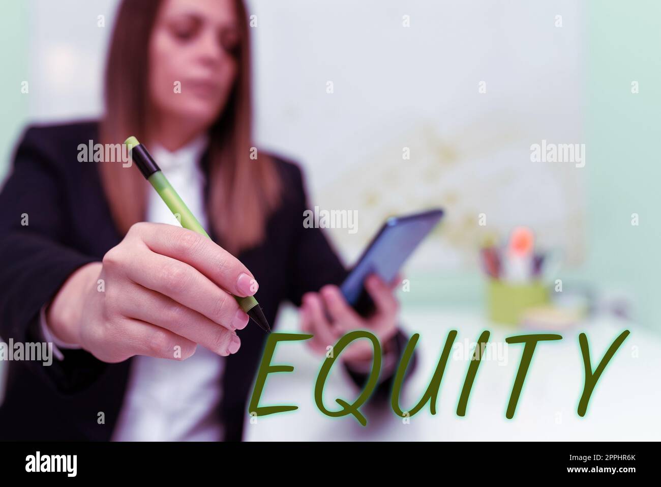 Hand writing sign Equity. Word Written on quality of being fair and impartial race free One hand Unity Stock Photo