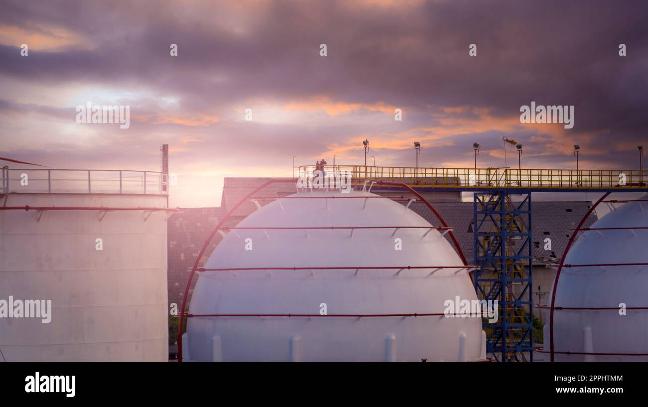 Industrial gas storage tank. LNG or liquefied natural gas storage tank. Energy price crisis. Gas tank in petroleum refinery. Energy crisis. Natural gas storage industry and global market consumption. Stock Photo
