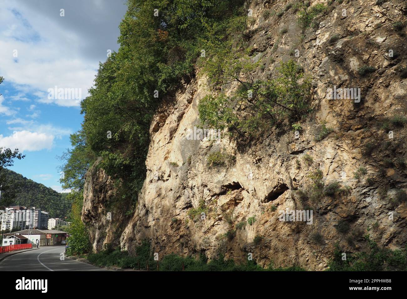 Mountain range in Mali Zvornik, Serbia, September 29, 2022 Brasina antimony deposit, Guchevo. Rocks overhanging the road Stock Photo