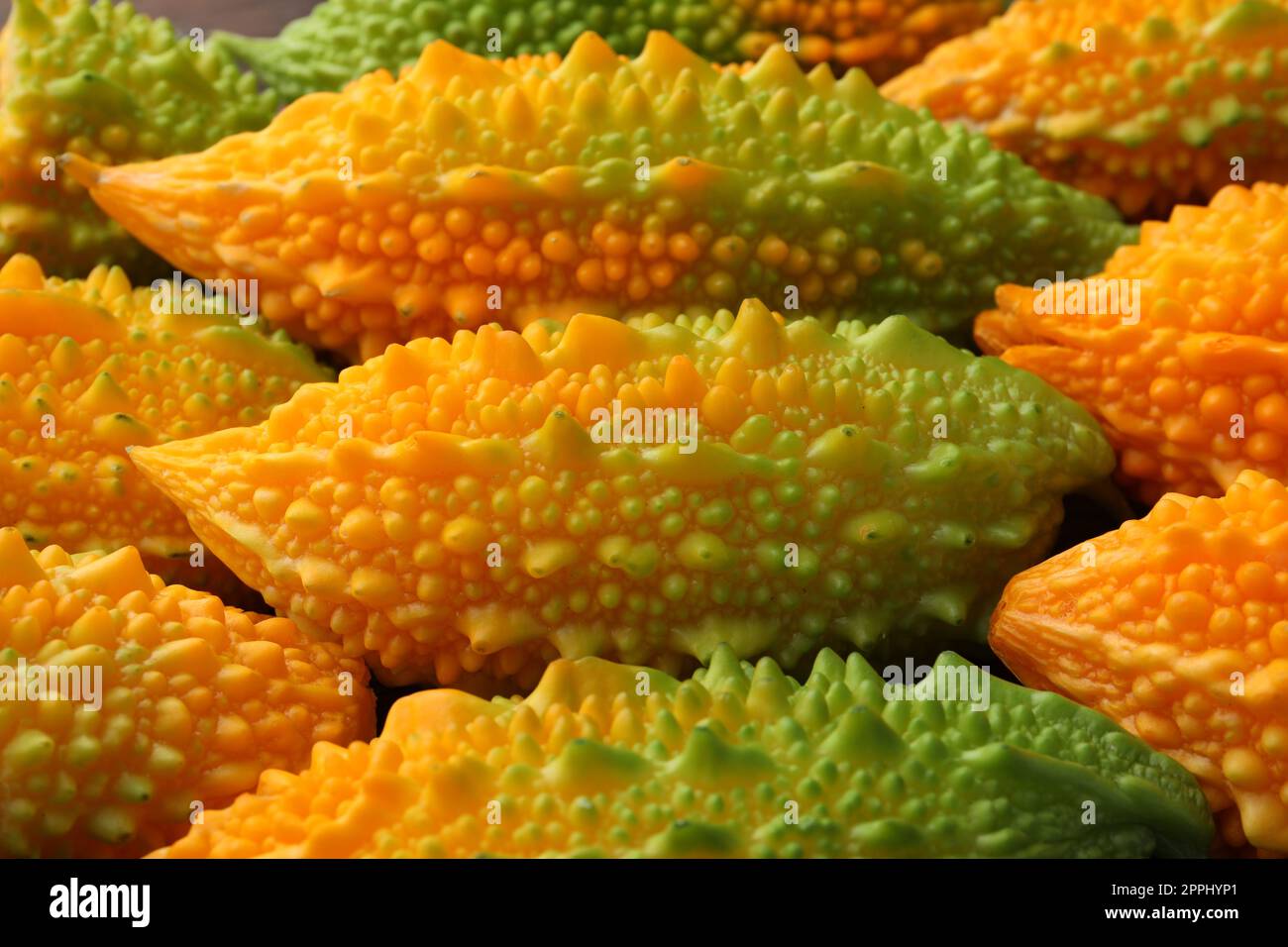 Tasty fresh bitter melons as background, closeup Stock Photo