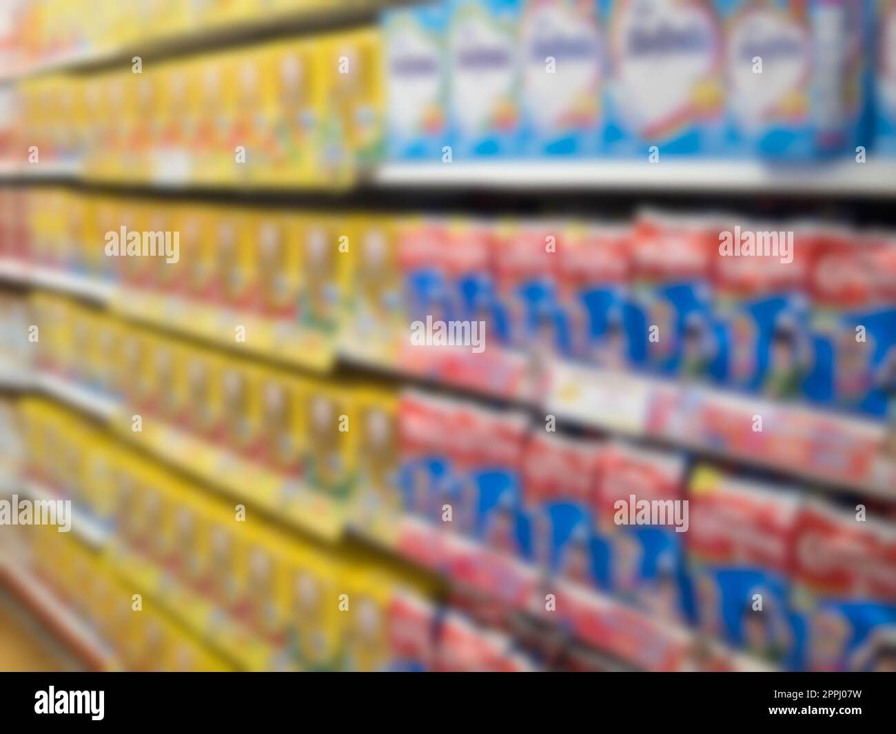 Blurred store shelves, milk section at a supermarket Stock Photo Alamy