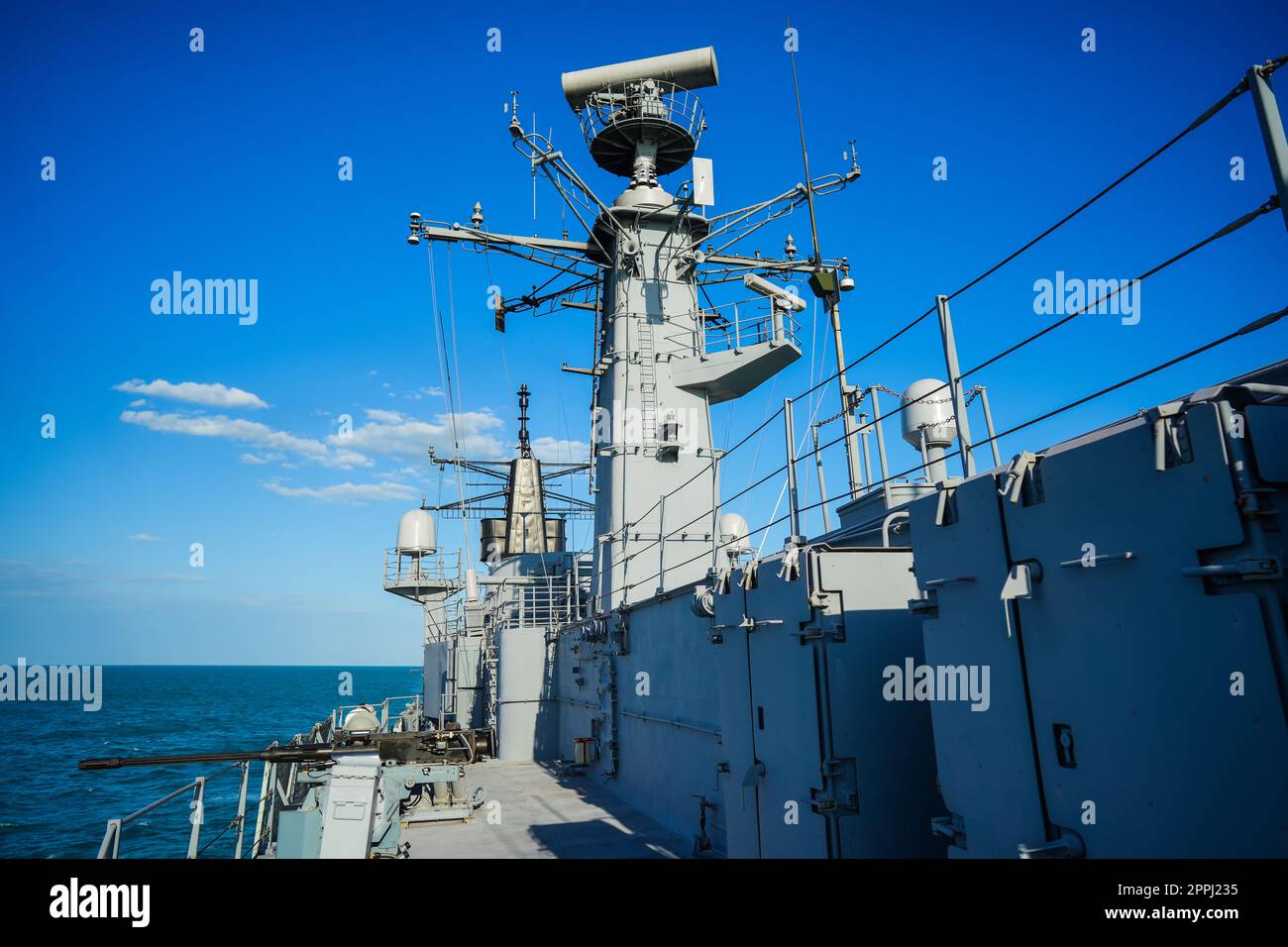 Military radar air surveillance on navy ship Stock Photo