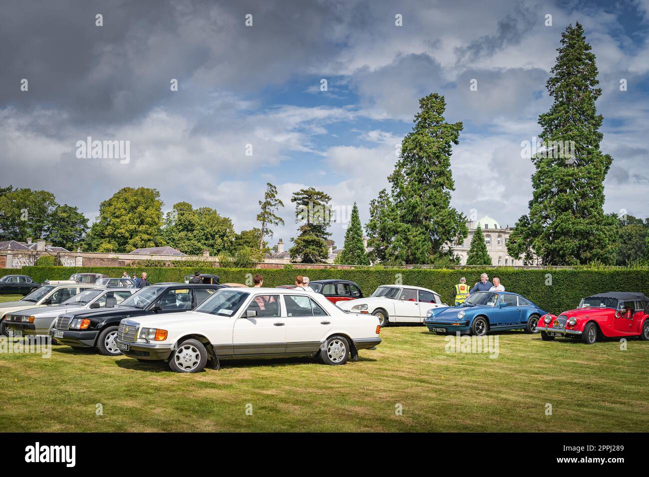 Vintage Car Club in Powerscourt, people admiring beautiful vintage cars