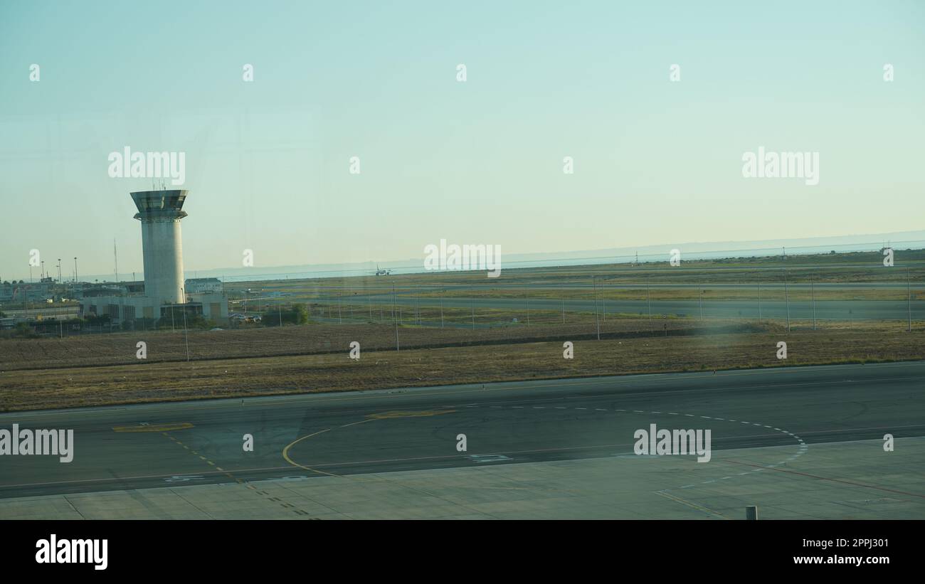 An airport with watchtower, or air traffic control (ATC). Stock Photo