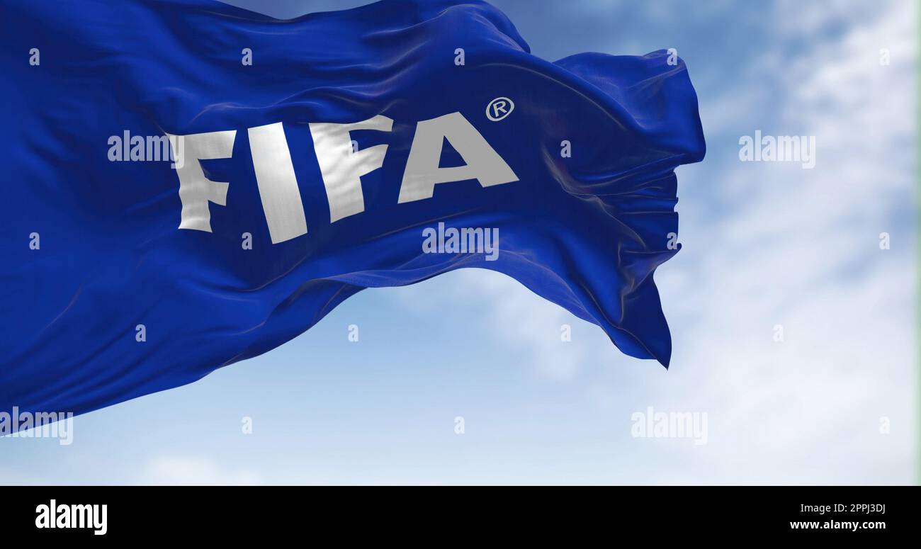 Close-up view of the Fifa flag waving in the wind Stock Photo