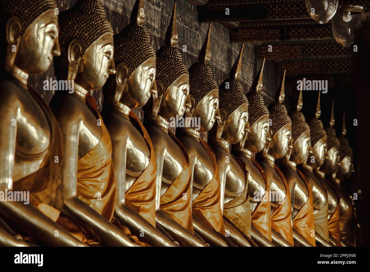 Golden Buddha beside old walls in Thai temples Stock Photo - Alamy