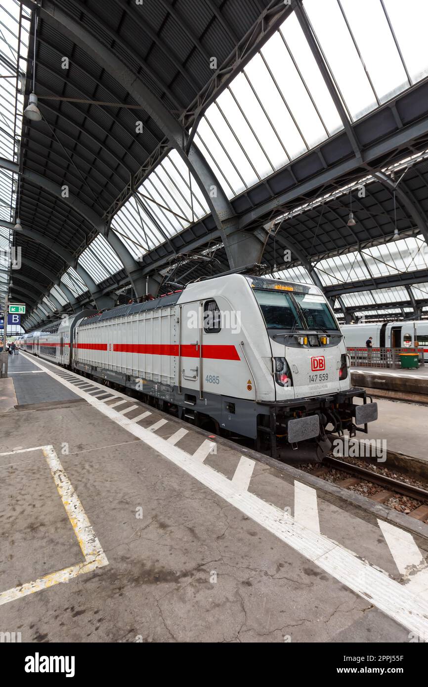 InterCity IC train type Twindexx Vario by Bombardier of DB Deutsche Bahn portrait format at Karlsruhe main station in Germany Stock Photo