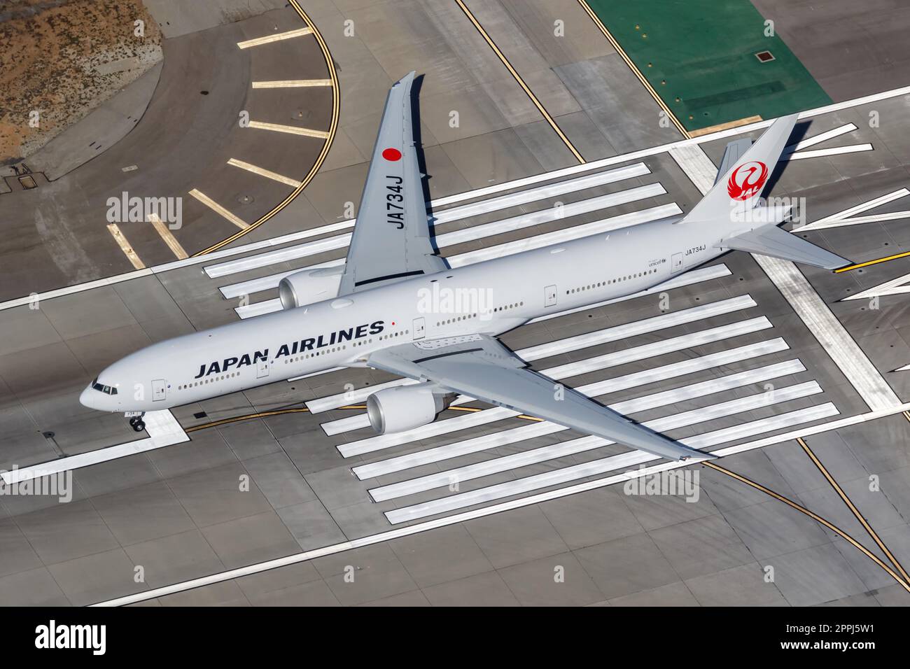 Japan Airlines Boeing 777-300(ER) airplane at Los Angeles airport in the United States aerial view Stock Photo