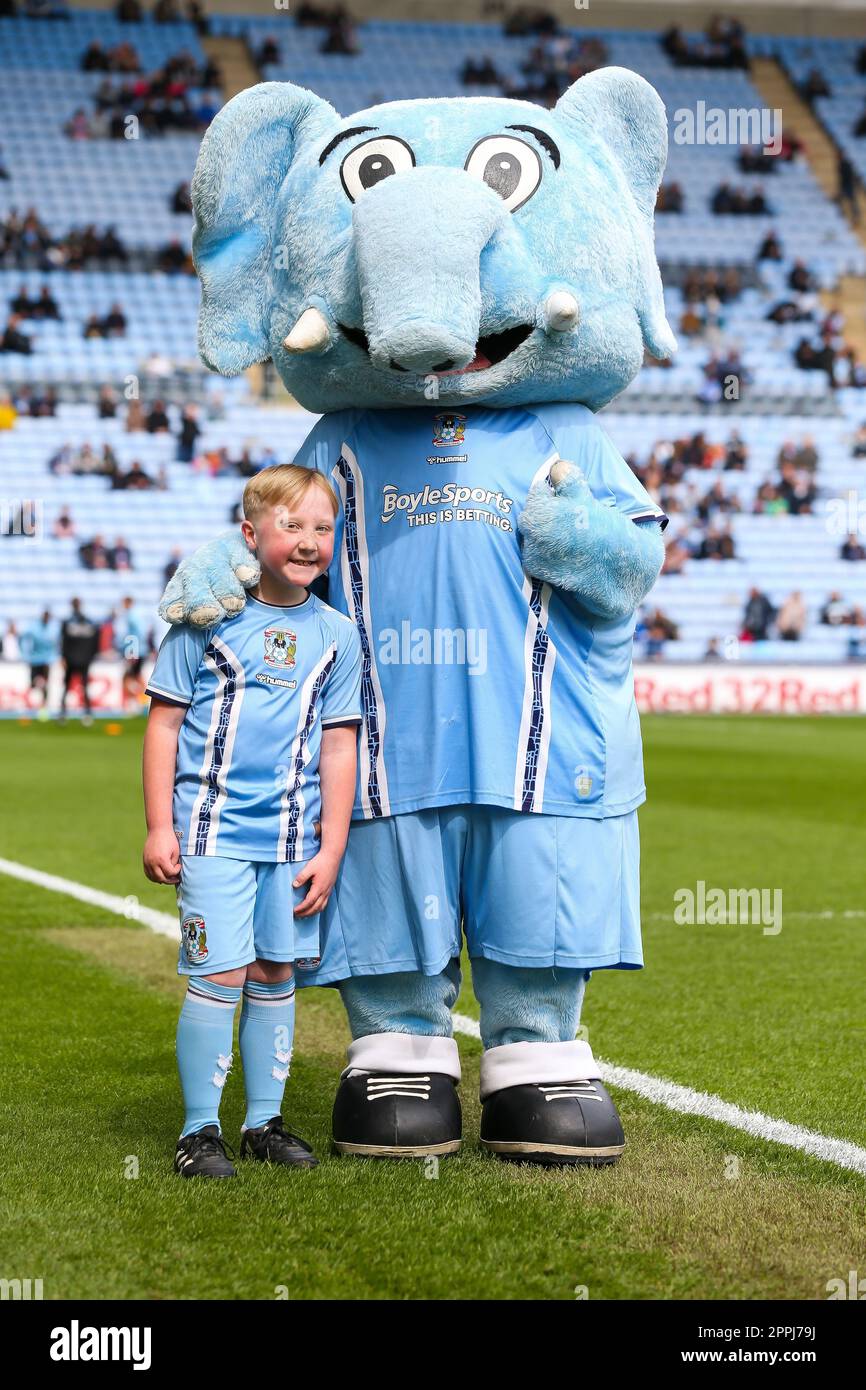 Coventry City match day mascots pose with Sky Blue Sam during the Sky
