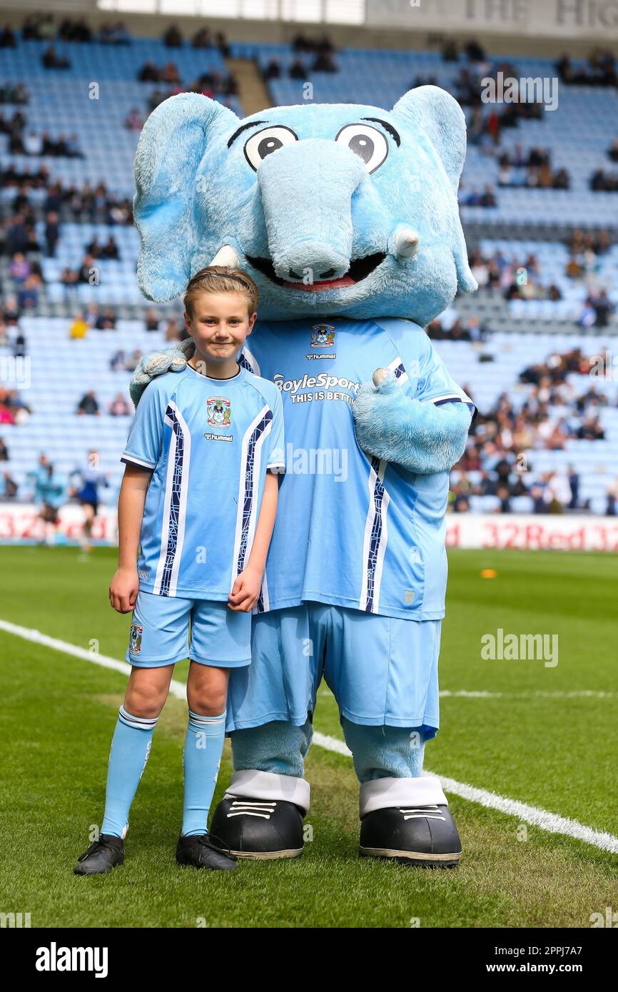 Coventry City match day mascots pose with Sky Blue Sam during the Sky