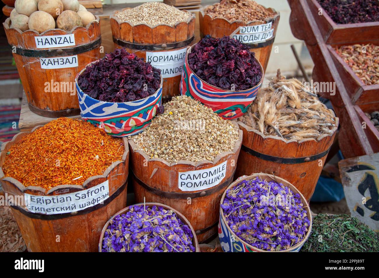 Street bazaar on an Egyptian street with dried flowers and leaves of various kinds of tea, chamomile, saffron, Dahab, Egypt Stock Photo