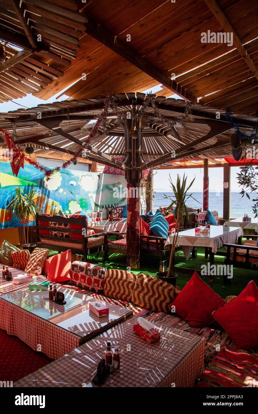 Restaurant on the shores of the Red Sea, on the main promenade in exotic small town on the Red Sea, Dahab, Egypt Stock Photo