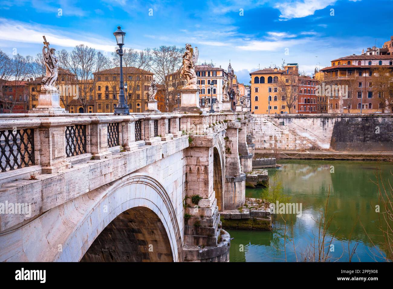 Rome riverfront and Tiber river Sant Angelo bridge view Stock Photo