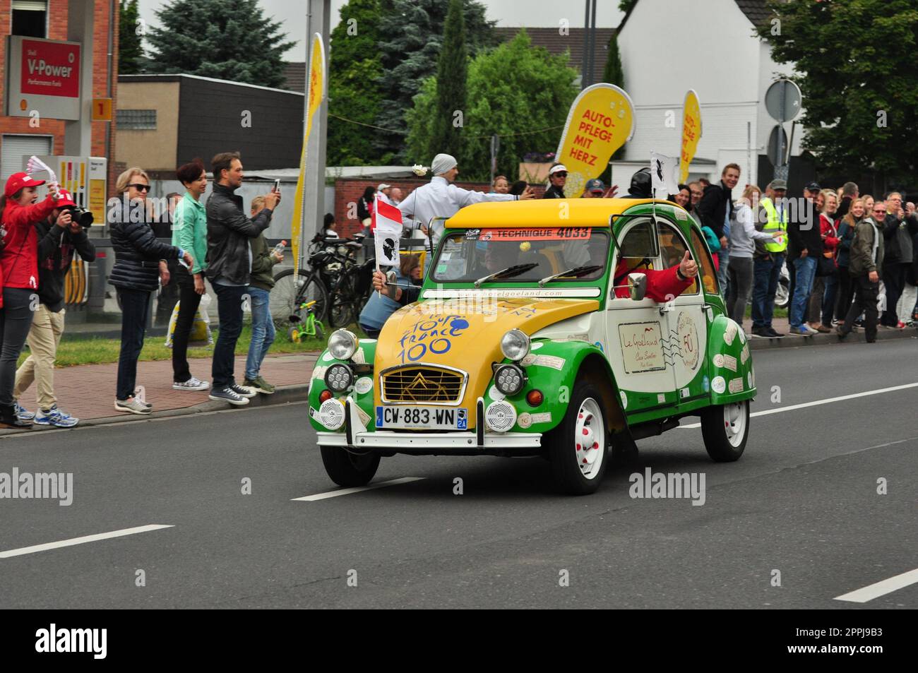 Cute green and yellow Citroen 2CV at the 2017 Tour de France in Meerbusch, Germany Stock Photo