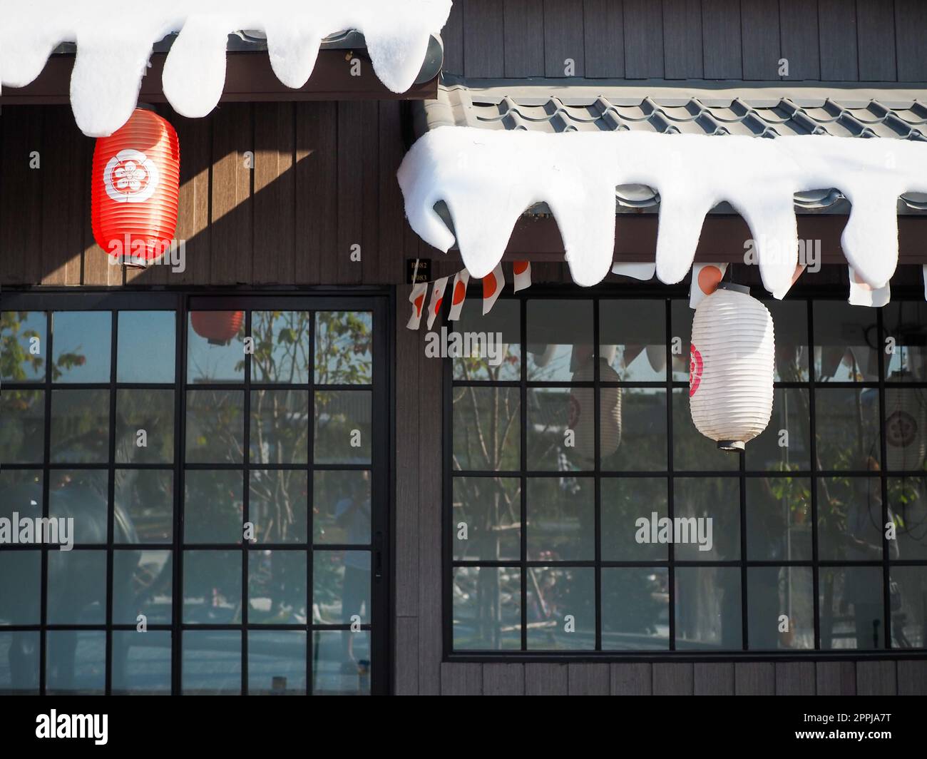 Japanese lantern hung in front of Japanese Restaurant, Japanese text on