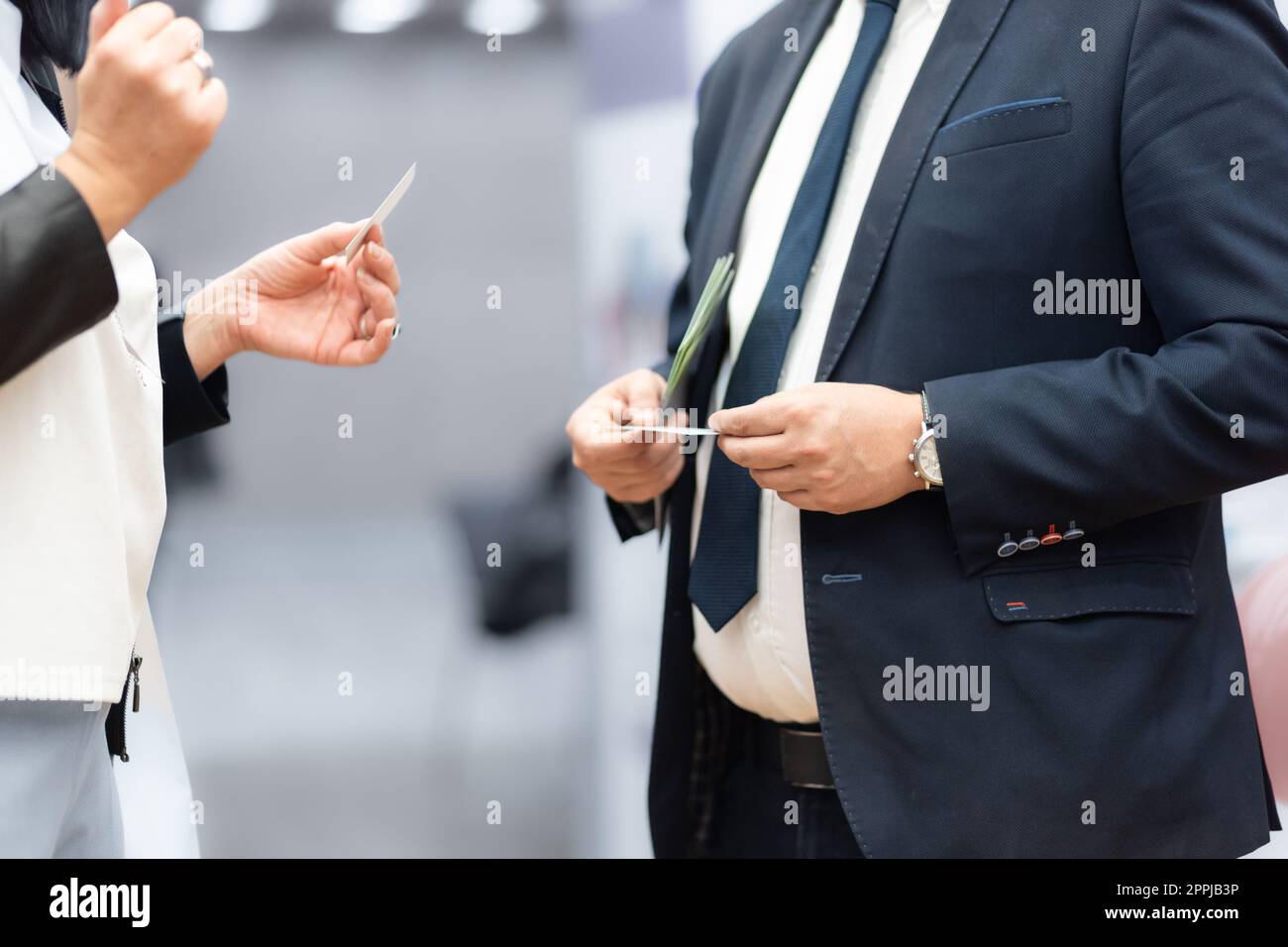 Business people exchanging business card on business meeting, Business discussion talking deal concept Stock Photo