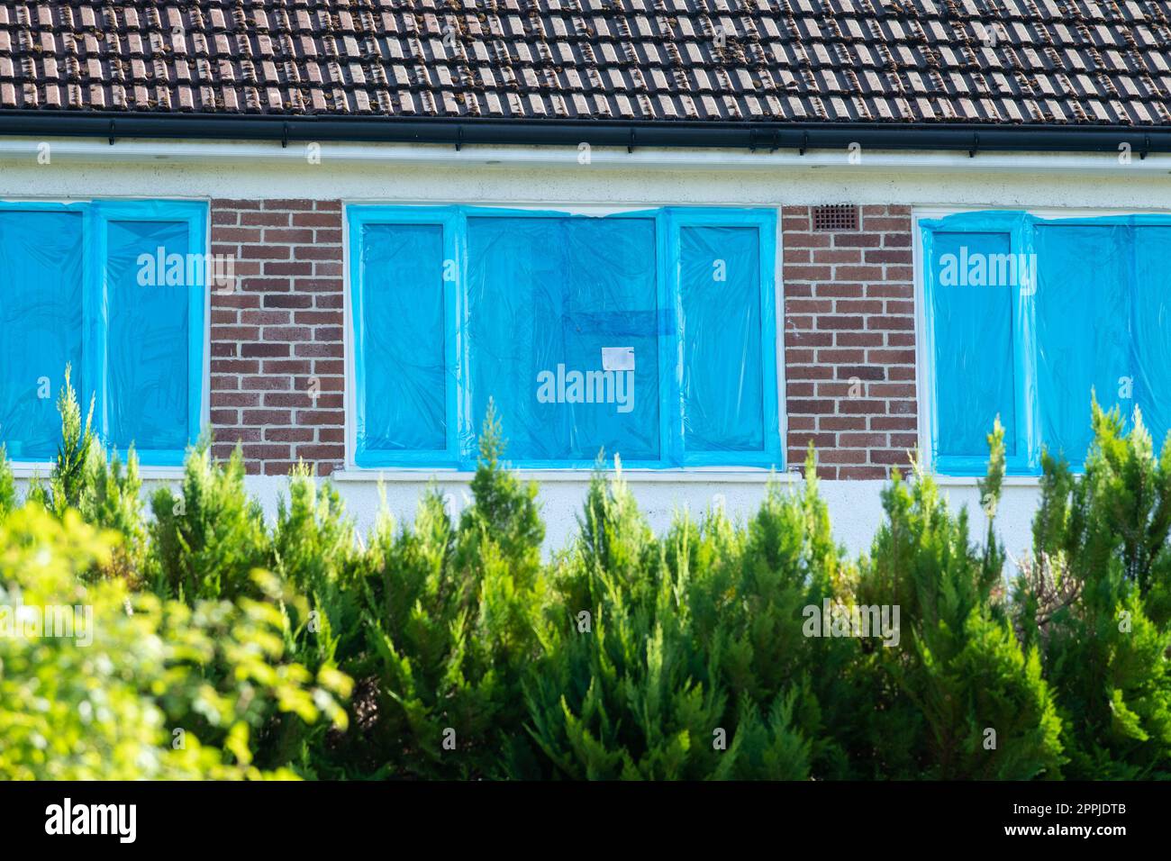 Protecting windows from overspray hires stock photography and images