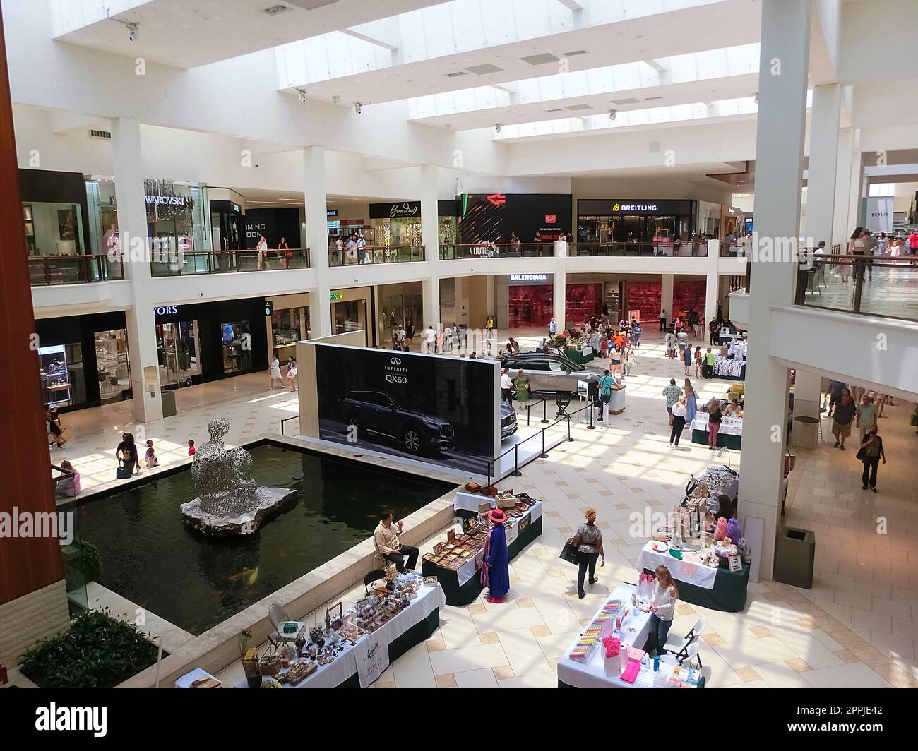 Miami Florida,Aventura Mall,atrium shopping shoppers shops,stores  businesses multi-level indoor inside interior stores kiosks Stock Photo -  Alamy