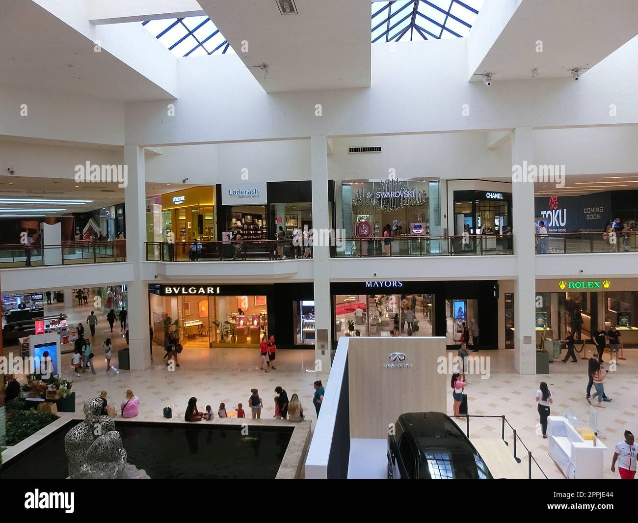 Miami Florida,Aventura Mall stores shoppers shopping fountain enclosed  complex inside interior Stock Photo - Alamy